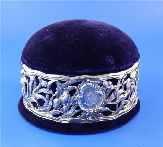 An Edwardian Art Nouveau silver mounted circular pin cushion/trinket box by Goldsmiths & Silversmiths Co Ltd, 7.25in.